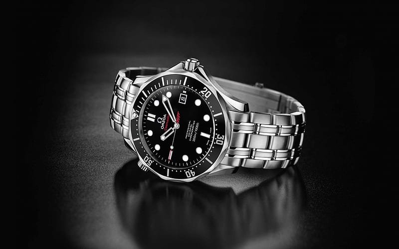Omega Seamaster professional diver watch featuring a black dial and stainless steel link bracelet.